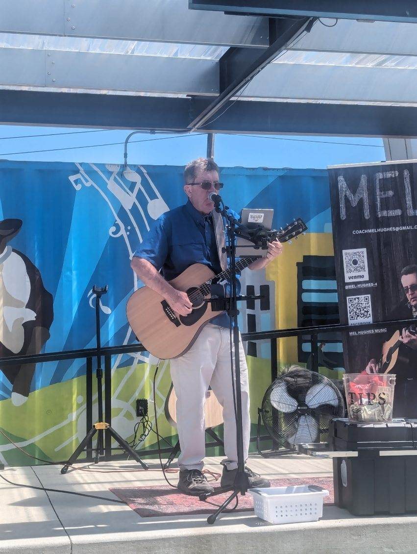 Mel Hughes performing live
